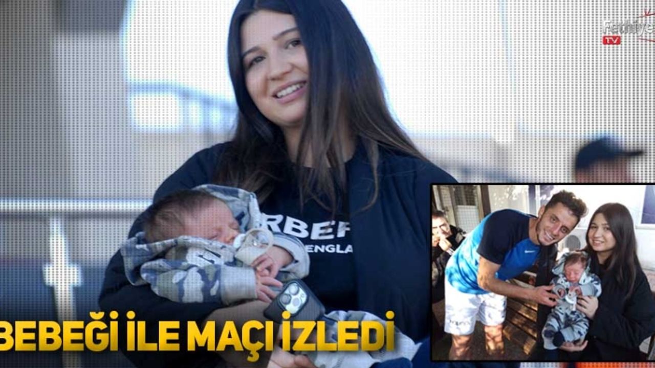 BEBEĞİ İLE MAÇI İZLEDİ